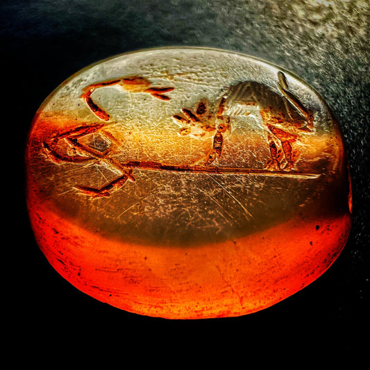 Sassanian carved gemstone, 3rd Century AD.  Depicting a face-off between a domestic cat and a snake.